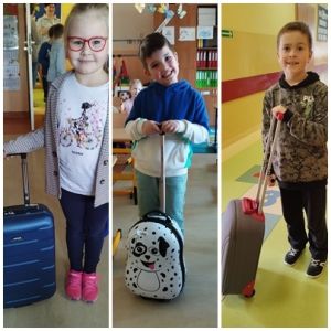 Otwórz zdjęcie - Uczniowie klasy 1 spakowani w walizki